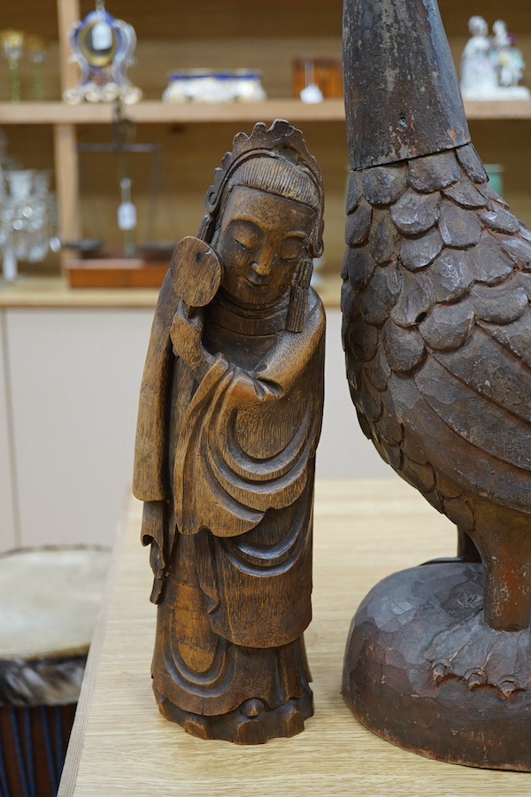 A Chinese bamboo figure of a lady and a large carved wooden bird, 55cm high. Condition - fair